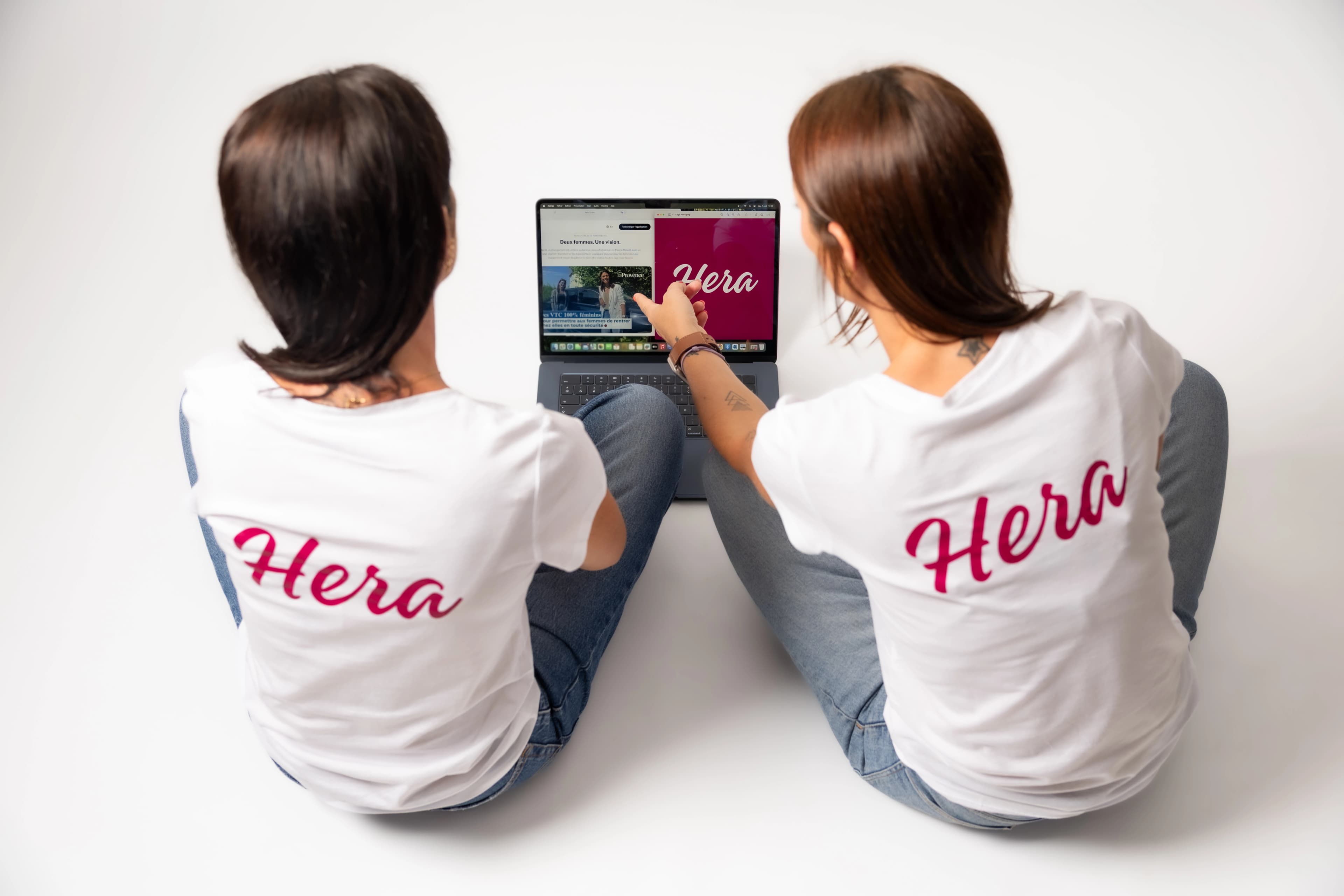 Woman using Hera13 app in car